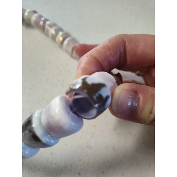 Spiral Puka Shell Necklace 23 inch length with 3/4 wide multi-color shells